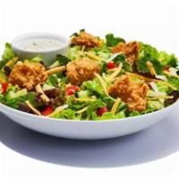 Chicken Garden Salad · Spring mix greens piled with diced tomatoes, crisp cucumbers, cheddar cheese, Monterey Jack ...