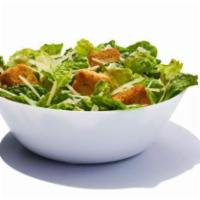 Side Caesar Salad · Fresh chopped Romaine, Parmesan cheese and crispy season croutons with a creamy Caesar dress...