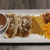 Picadillo Beef Tacos · Ground chuck, potato, carrot, onion, tomato, Serrano peppers and Mexican spices. Served as m...