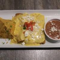 Cheese Enchiladas with Queso Sauce · Three hand-rolled enchiladas. Chihuahua cheese, queso and queso fresco.