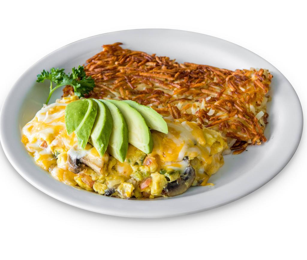 Veggie Omelette · Fresh mushrooms, tomato, onion, and bell pepper with jack and cheddar cheese topped with fresh avocado.