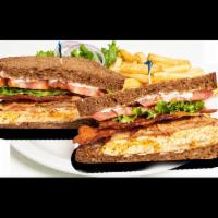 Cajun Chicken Sandwich · Chicken breast seasoned with Cajun spices, topped with melted jack cheese and bacon on sweet...