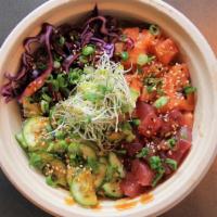 The Poke Special Bowl · Salmon, shrimp, cucumber, seaweed salad, green onion, mango, furikake and lime ponzu.