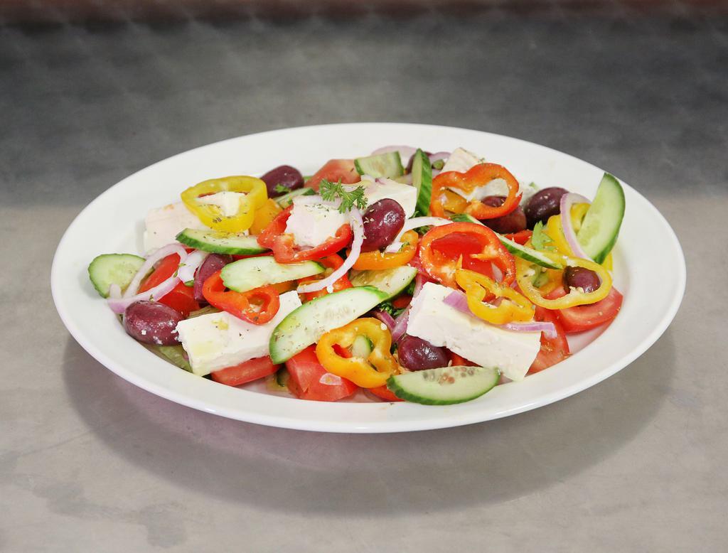 GREEK  SALAD · Authentic Greek Salad - Tomatoes - Cucumber - Onions - Feta Cheese - Kalamata Olives - Peppers - Greek Oregano - Olive Oil - Balsamic Vinegar & Pita Bread.