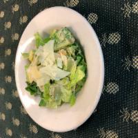 Classic Caesar Salad · Served with dressing on the side.
