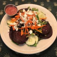 GOAT CHEESE & ROASTED BEET · WITH CUCUMBERS, CARROTS, FRESH GREENS, & W/ RASPBERRY VINAIGRETTE DRESSING ON THE SIDE