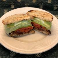 TAVERN BLT ·   Crisp bacon, lettuce, tomato & mayo on choice of toast, with home- made potato chips. Avac...