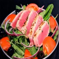 Ahi Tuna Salad · Seared Ahi Tuna slice, egg, tomato, mixed greens with house dressing.