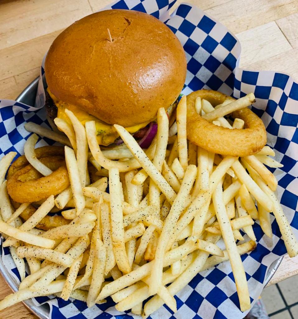 Urban Burger · 1/2 lb. Angus beef, American cheese, lettuce, onions, tomato and green chile. Served with fries and onion rings.