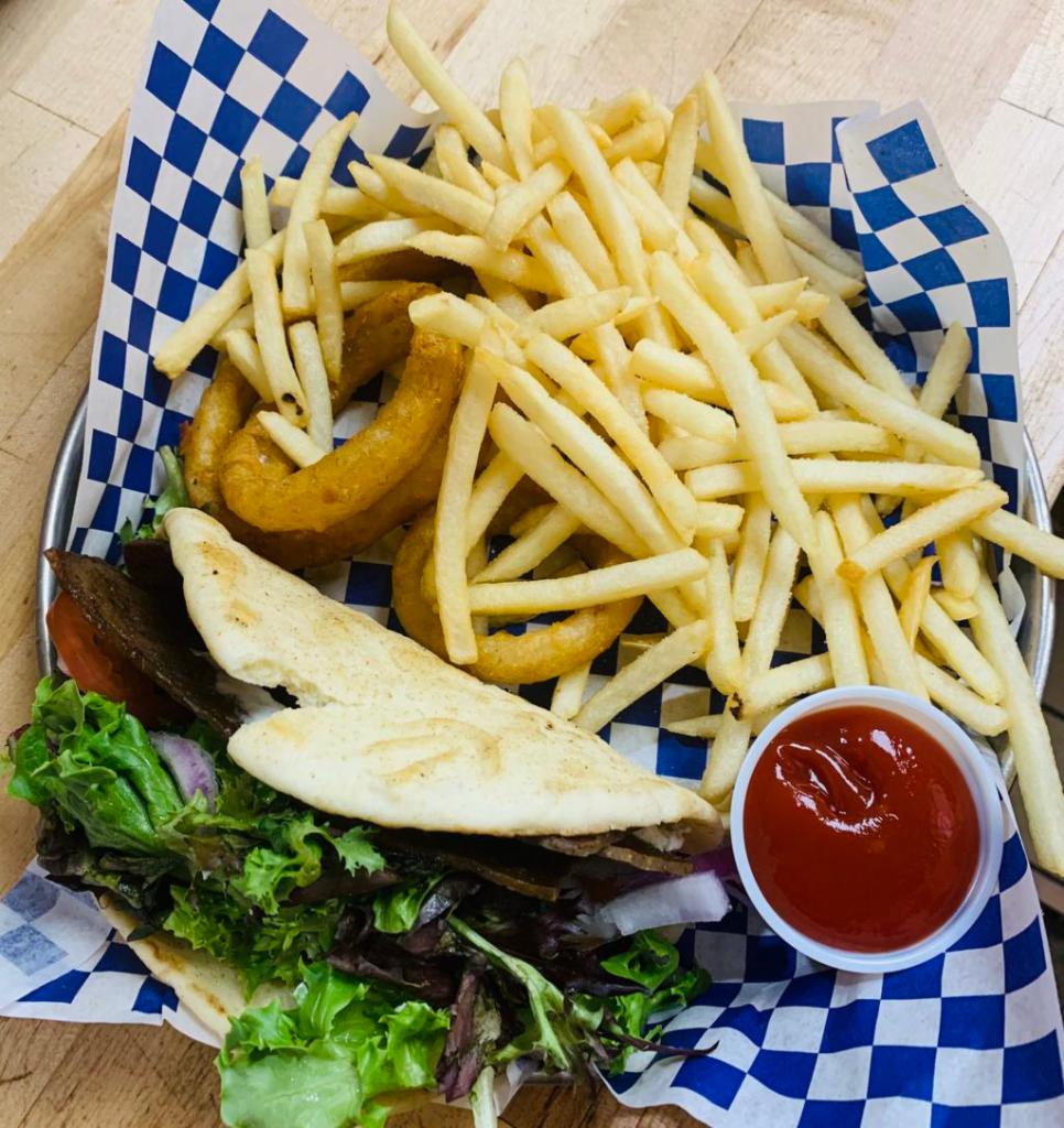 Gyro Sandwich · Lam and beef, pita bread, feta, onions, tomato, tzatziki sauce and spring mix. Served with fries and onion rings.