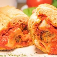 Meatball Sub · 3 Homemade XL 5 ounce meatballs, melted provolone, red sauce.