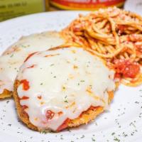 Chicken Parmesan · Breaded chicken baked with red sauce and mozzarella cheese.  Served with a side of pasta and...