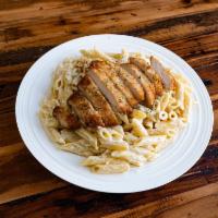 Penne Alfredo · Homemade alfredo sauce tossed in penne pasta. Served with a small salad and a roll.  Pairs w...