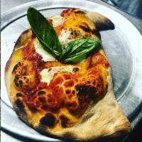Calzone Napolitano (Made for Two) · Fresh ricotta, pecorino Romano and fresh mozzarella. Topped with pizza sauce, mozzarella and...