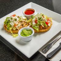 2 Sopes Mexicanos · Round shape. Handmade corn tortillas topped with beans, avocado, Mexican cream and cheese. C...