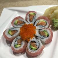 Cherry Blossom Roll · Salmon avocado roll topped with tuna and tobiko.