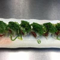 Swabble Roll · Spicy tuna roll topped with seaweed salad.