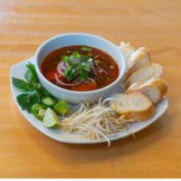 S6. Beef Stew Noodle Soup · Savory light broth with noodles. 