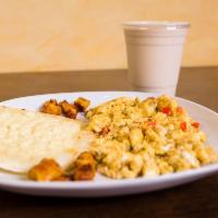 Huevos Al Gusto · Acompanados de arepa con queso o arroz. Eggs any style with cheese topped arepa or rice.