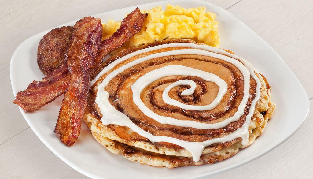 Ultimate Pancake Combo · Two flavored pancakes, two eggs, two bacon strips and one sausage patty. 920-2000 cal.