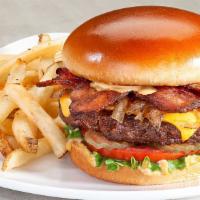 Smoky Chipotle Burger · Bacon, caramelized onions, American Cheese, spicy chipotle mayo, lettuce, tomato, pickles.
