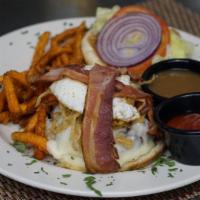 Dark Horse Signature Burger · Sirloin burger, Swiss, bacon, haystack onions, fried egg and Jack Daniel's gravy. Served wit...