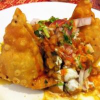 Samosa Chaat (Veggie) · 2 Vegetable Samosa served with garbanzo beans with special blend of spices.(Big portion)