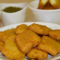 Paneer Pakora · Homemade cheese pieces dipped in batter and deep fried.