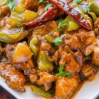 Chili Chicken · Lightly battered crispy chicken chunks tossed in a spicy chili sauce.