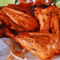Tandoori Chicken 2 Leg's (4Pc.) · Traditional Indian dish of flavors! Marinated chicken roasted in clay oven.