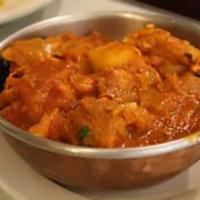 Chicken Vindaloo · Chicken and potatoes in tangy spicy chili sauce.