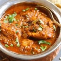 Chicken Vindaloo · Chicken and potatoes in tangy spicy chili sauce