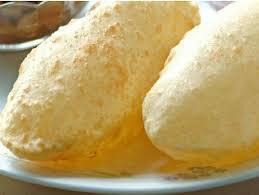 Bhatura (2pc) · Deep fried leavened flour bread.