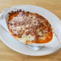 Earl's Lasagna · Freshly baked pasta with our homemade meat sauce between 6 layers of noodles. More sauce and...