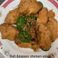 10 Pepper Salted Chicken Wings · Cooked wing of a chicken coated in sauce or seasoning.