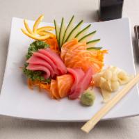 Sashimi Sampler · 3 pieces salmon, 3 pieces tuna and 3 pieces white fish.