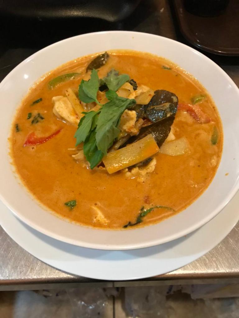 Red curry · Bamboo shoots,Bell peppers,Fresh Basil.