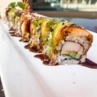 Dragon Roll · California roll topped with avocado and eel.