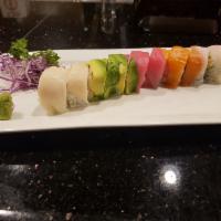 Rainbow Roll · California roll topped with avocado and assorted sashimi.