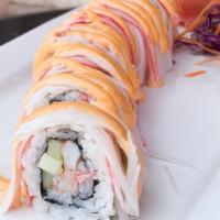 Round rock Snow Crab Roll · Snow crab, shrimp, cucumber topped with kani and spicy mayo.
