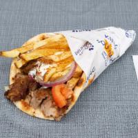 Pork Gyro Pita Sandwich · Mouthwatering slow roasted slices of our Hand-stacked Pork Gyro, carved off a rotisserie and...