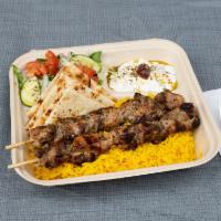 Chicken Souvlaki Platter · Two Sticks of our Hand Skewered Chicken Souvlaki over our Handcut Fries or Yellow Rice.
Come...