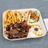 Pork Gyro Platter · Double portion of our slow roasted, Hand-stacked Pork Gyro over our Handcut Fries or Yellow ...