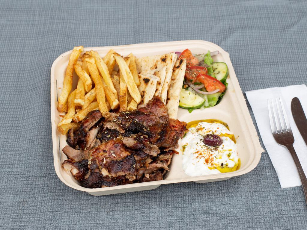 Pork Gyro Platter · Double portion of our slow roasted, Hand-stacked Pork Gyro over our Handcut Fries or Yellow Rice.
Comes with a side salad and your choice of bread, sauce, and toppings.