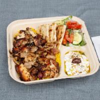 Chicken Gyro Platter · Double portion of our slow roasted, Hand-stacked Chicken Gyro over our Handcut Fries or Yell...