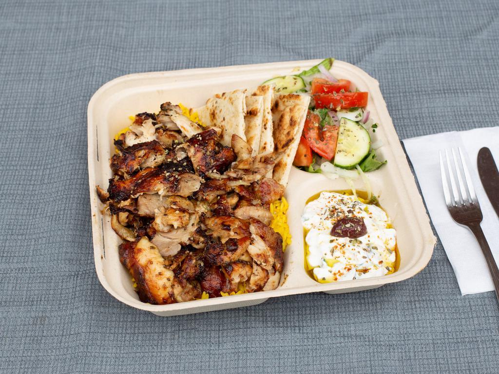 Chicken Gyro Platter · Double portion of our slow roasted, Hand-stacked Chicken Gyro over our Handcut Fries or Yellow Rice.
Comes with a side salad and your choice of bread, sauce, and toppings.