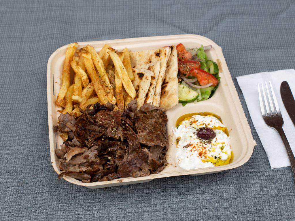 Lamb & Beef Gyro Platter · Double portion of our slow roasted, hand-stacked lamb and beef gyro over our handcut fries or yellow rice. Comes with a side salad and your choice of bread, sauce, and toppings. 