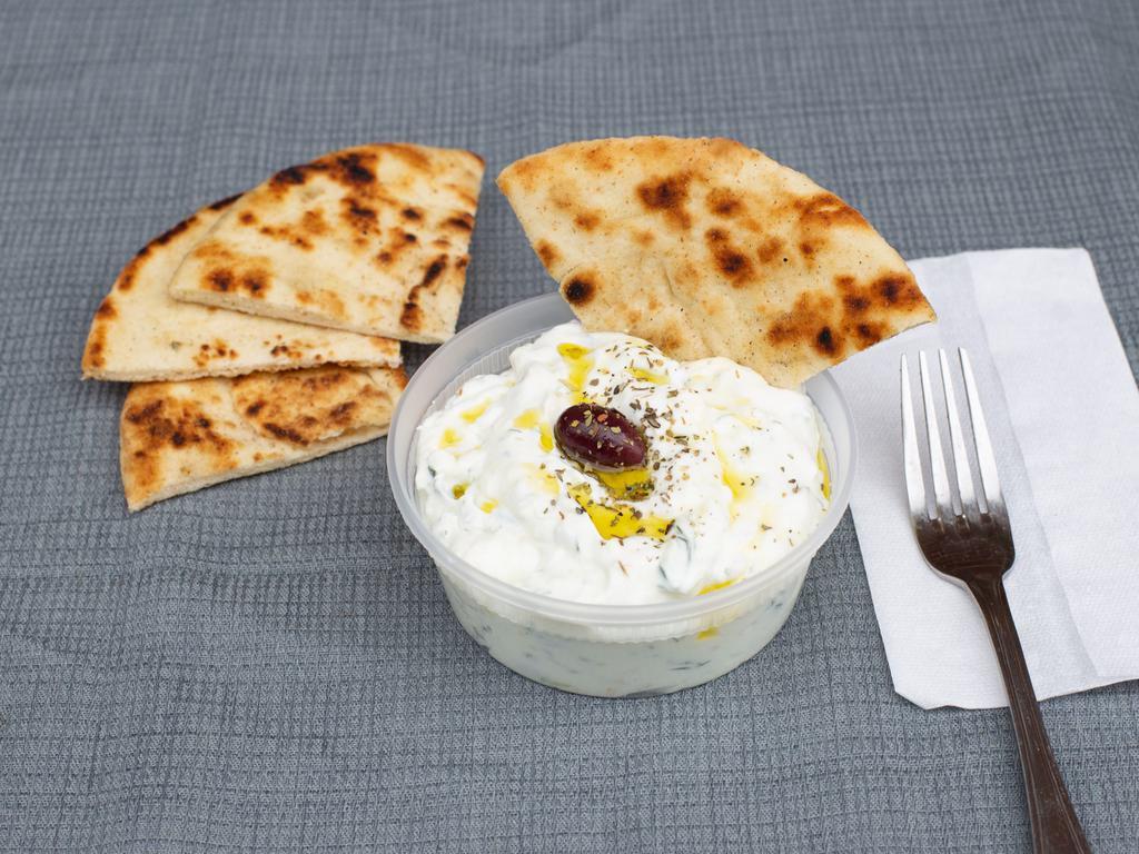 Tzatziki Dip · Homemade with Imported Greek Yogurt. Served with bread.