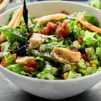 Fatoush Salad · lettuce, tomato, onion, house spices, pita chips, olive oil, lemon juice. Served with pita b...