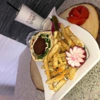 Falafel Wrap · fried ground chickpeas, lettuce, tomato, onion, hummus, tahini. Served with side of fries an...